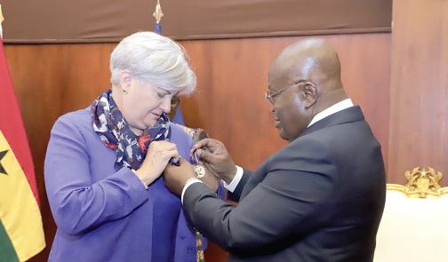 President Akufo-Addo decorating Stephanie S. Sullivan, the outgoing US Ambassador to Ghana, with the Grand Medal Award at the Jubilee House. Picture: SAMUEL TEI ADANO